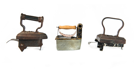 Vintage iron isolated over white background. の写真素材