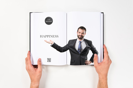 Businessman making showing printed on bookの写真素材