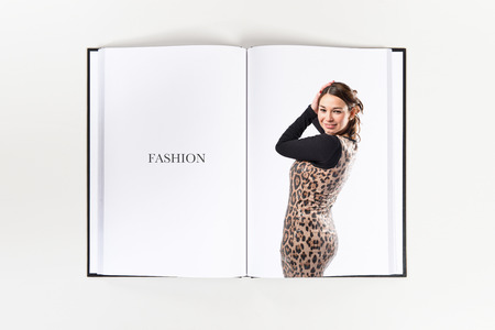 Pretty brunette asian girl over white background の写真素材