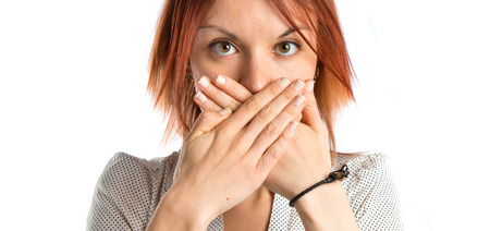 Girl doing surprise gesture over white background