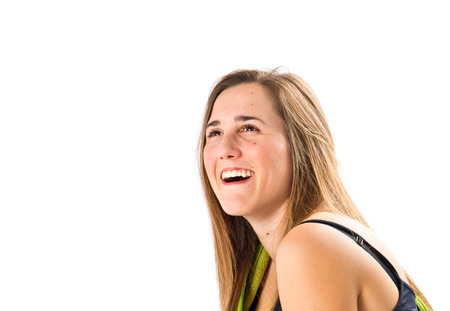 Young girl with basketball over white backgroundの写真素材