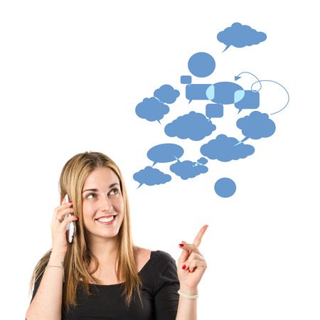 Young girl talking on mobile over white background