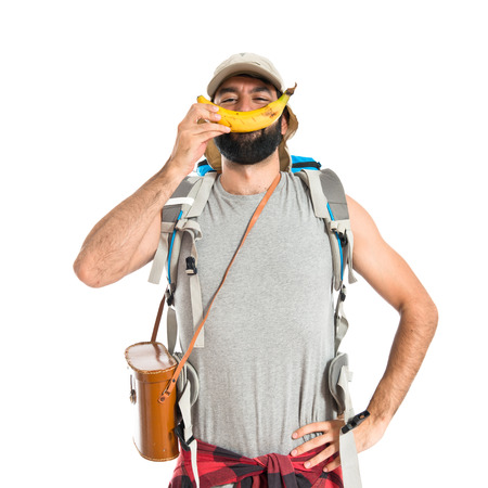 Man making a happy gesture by bananaの写真素材