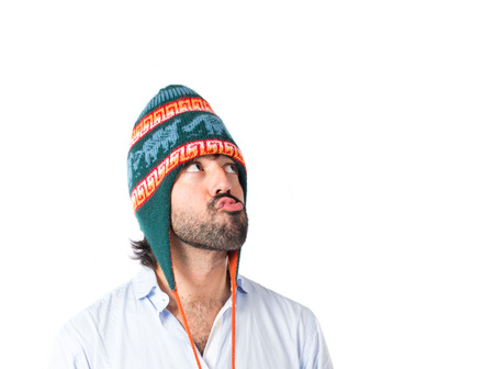 Man with hat over white background