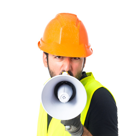 Workman shouting over isolated white backgroundの写真素材