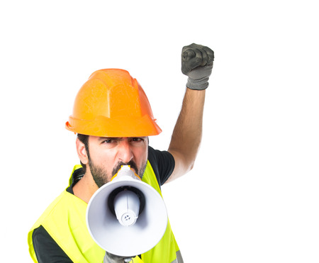 Workman shouting over isolated white backgroundの写真素材