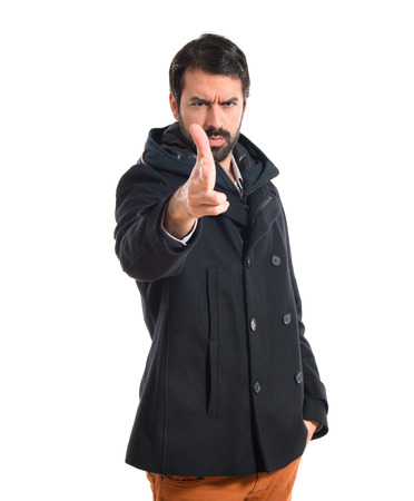 Man making gun gestureの写真素材