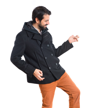 Man making guitar gestureの写真素材