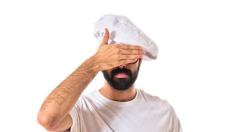 Chef covering his eyesの写真素材