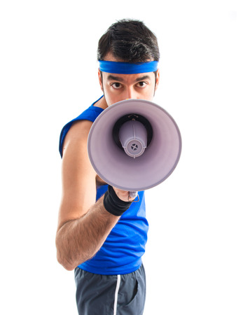 Sportman shouting by megaphoneの写真素材