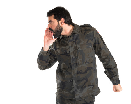 Soldier shouting over white backgroundの写真素材