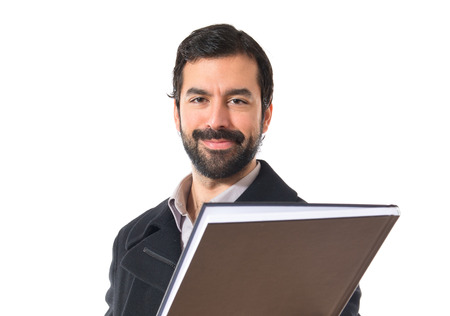 Man holding a bookの写真素材