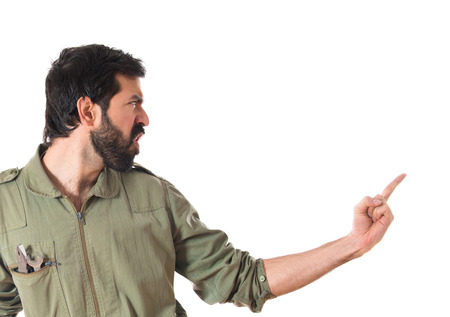 Mechanic shouting over white backgroundの写真素材