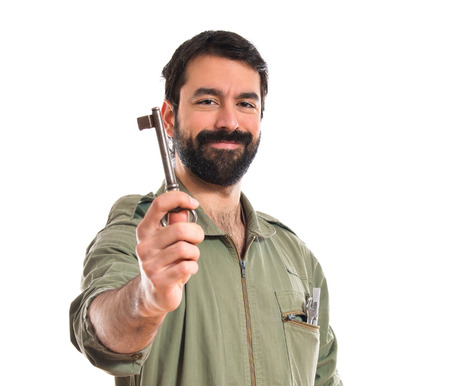 mechanic holding vintage key