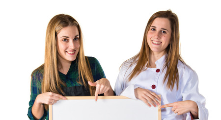 Chefs holding an empty placardの写真素材