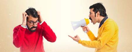 Man angry with his brotherの写真素材