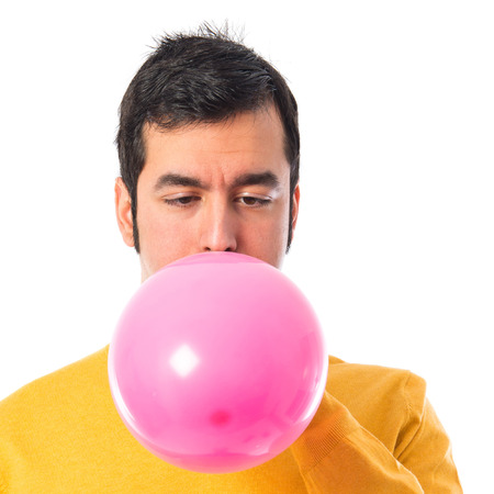 Man with pink balloonの写真素材