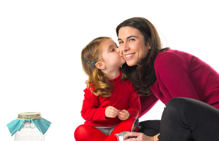 Mother and daughter playing cookingの写真素材