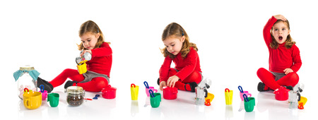 Little girl playing cookingの写真素材