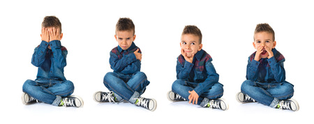 Sad kid over white backgroundの写真素材