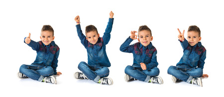 Lucky kid over white backgroundの写真素材