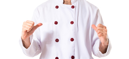 Chef doing surprise gesture over white backgroundの写真素材