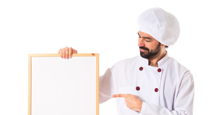 Chef holding empty placardの写真素材