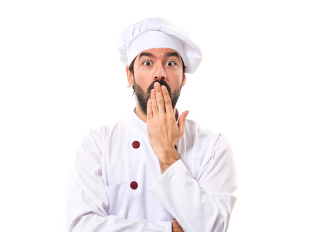 Chef doing surprise gesture over white backgroundの写真素材