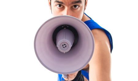 Sportman shouting by megaphoneの写真素材