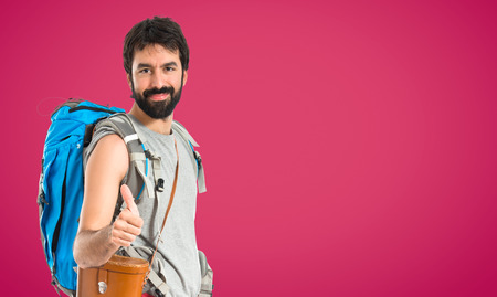 Man with thumb up over white backgroundの写真素材