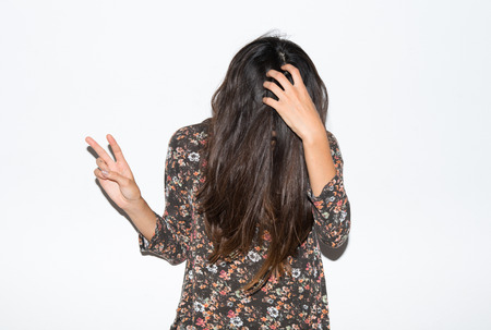 Woman doing victory gestureの写真素材