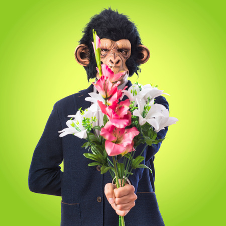 Monkey man holding a bouquetの写真素材