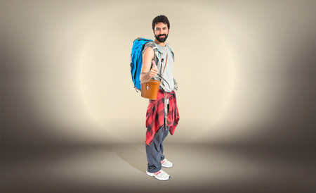 Man with thumb up over white backgroundの写真素材