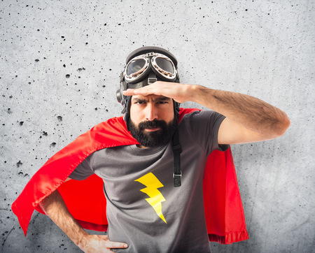 Superhero showing somethingの写真素材