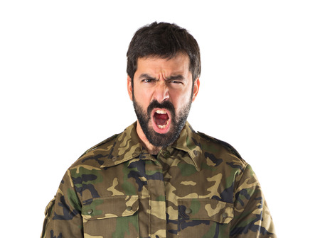 Soldier shouting over white backgroundの写真素材