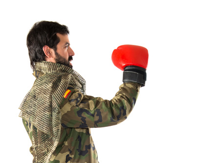 Soldier with boxing glovesの写真素材