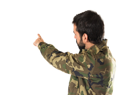 Soldier pointing backの写真素材