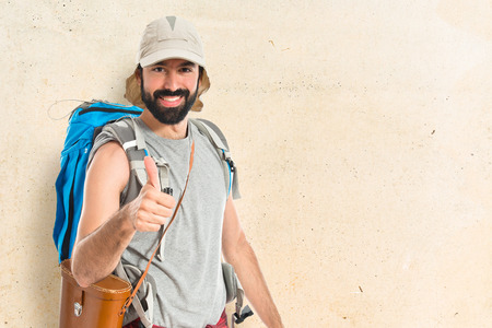 Man with thumb up over white backgroundの写真素材