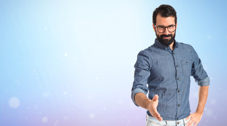 Young hipster man making a dealの写真素材