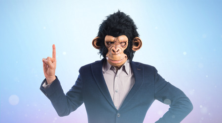 Monkey man pointing upの写真素材