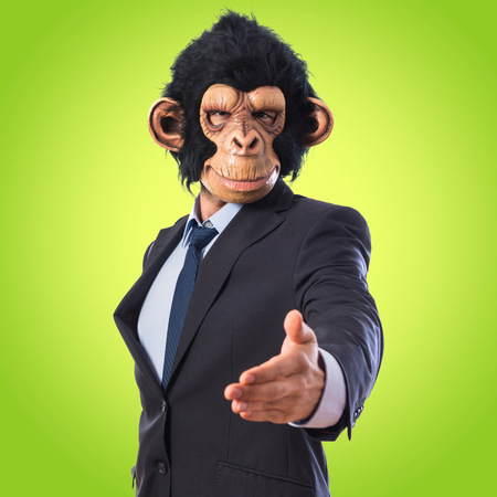 Monkey man making a dealの写真素材