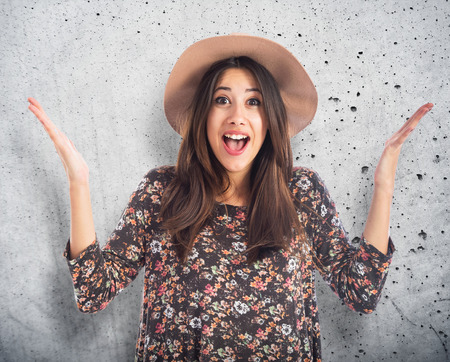 Happy woman doing surprise gestureの写真素材