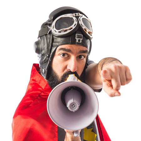 Superhero shouting by megaphoneの写真素材