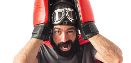 frustrated superhero over white backgroundの写真素材