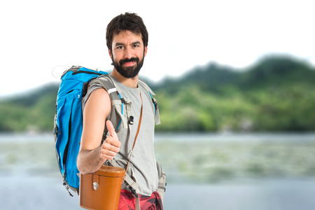 Man with thumb up over white backgroundの写真素材