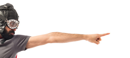 Super hero pointing to the lateralの写真素材