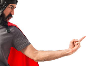 Superhero shouting and pointing lateralの写真素材