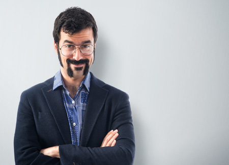 Vintage young man with his arms crossedの写真素材