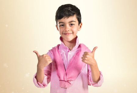 Boy with thumb upの写真素材