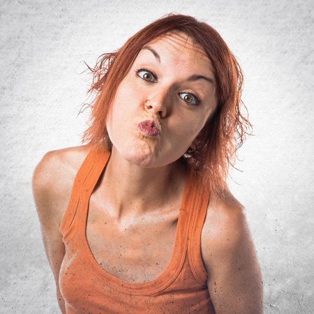 Woman sending a kissの写真素材